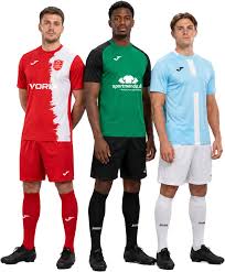 Team members wearing sports jerseys and kits